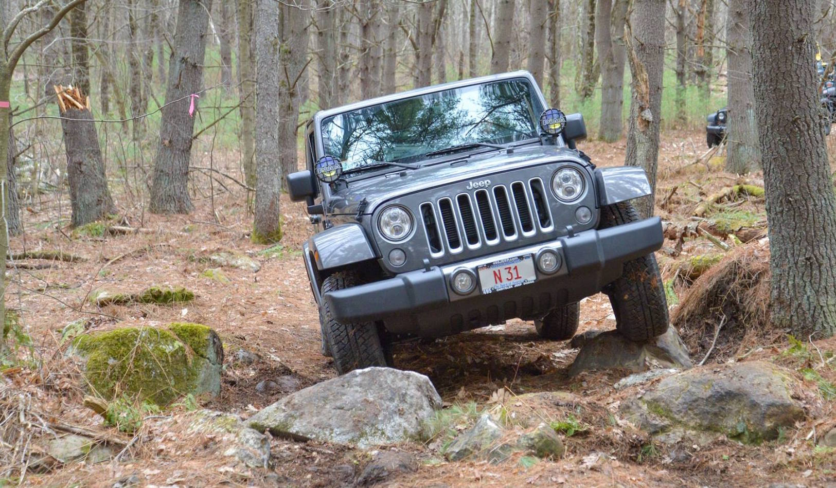 Jeeps on rocks